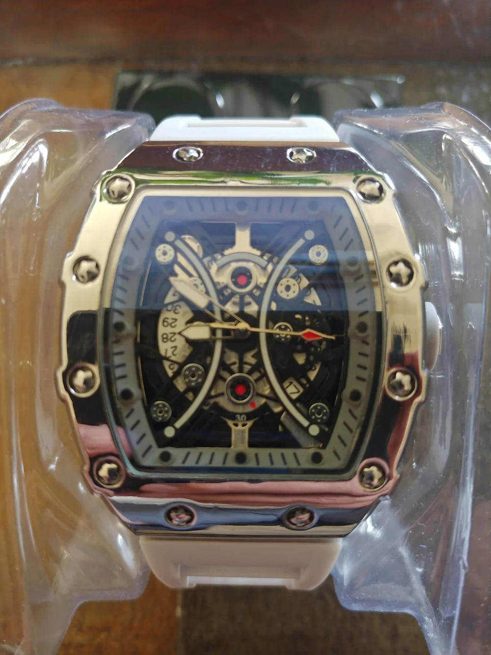 White and Silver Skeleton Sport Watch With Date.